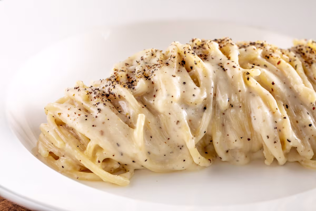 Penny Roma signature dishes Cacio e PepeTagliatelle al RaguProsciutto di Parma with seasonal fruit